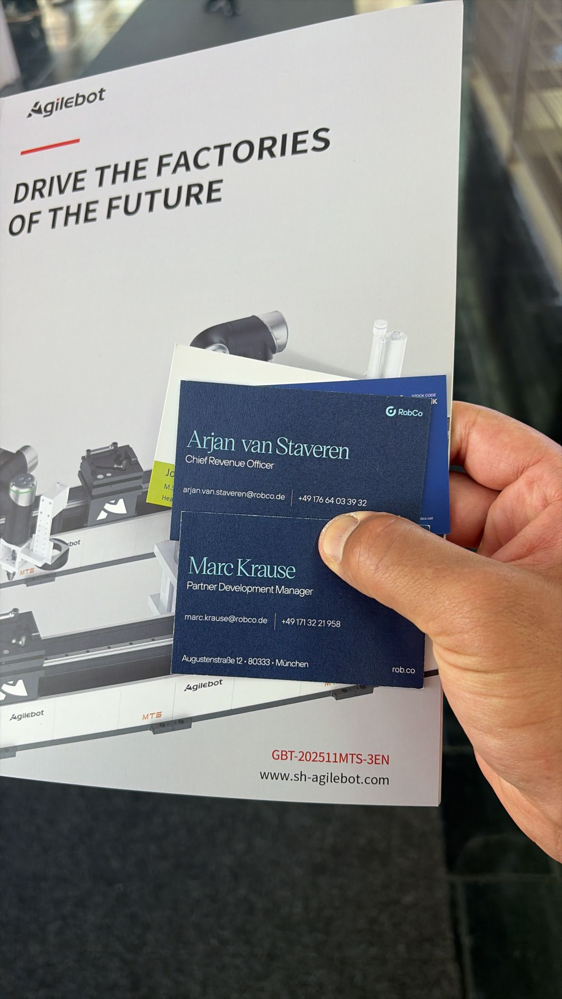 Business cards from Arjan van Staveren (CRO) and Marc Krause (Partnerships)